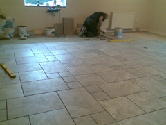 Lounge Floor Tiling Underway